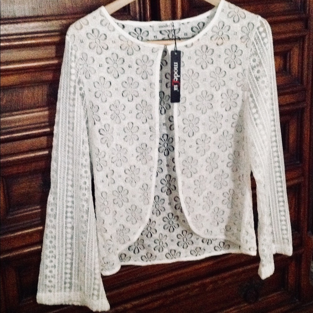 White lace coverlet/ jacket.